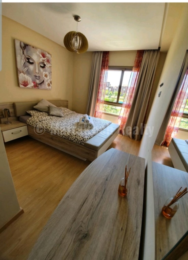 Long term rental : this 2 bedroom apartment in a gated community with golf course