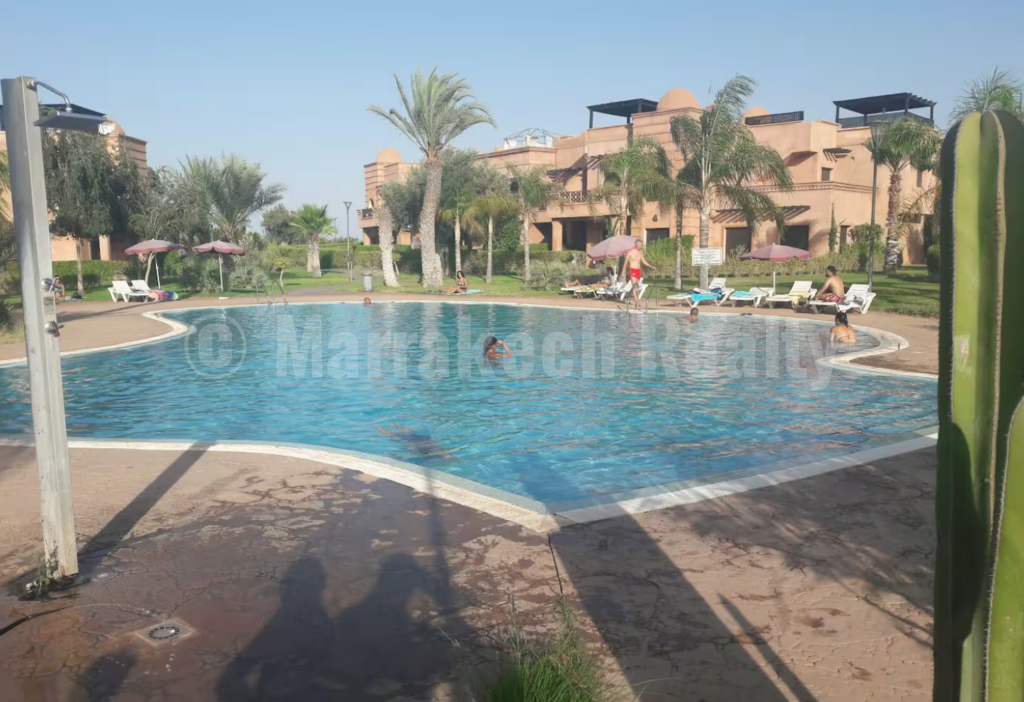 Bel appartement dans résidence sécurisée avec piscine, tout proche de Marrakech