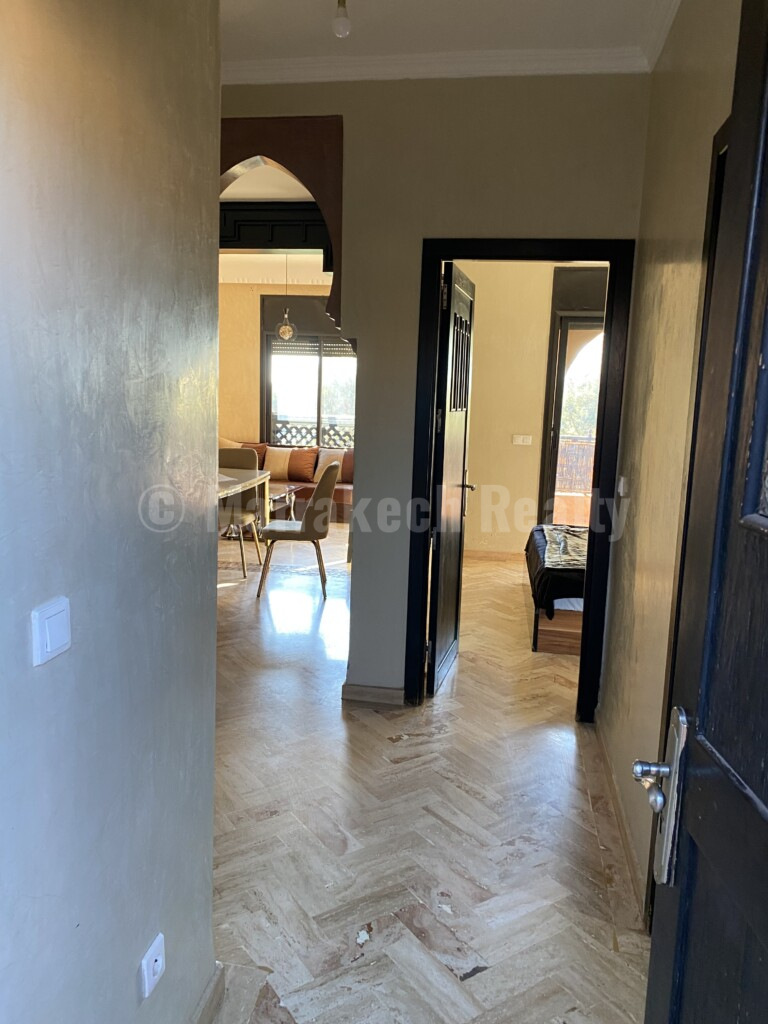 Bel appartement dans résidence sécurisée avec piscine, tout proche de Marrakech