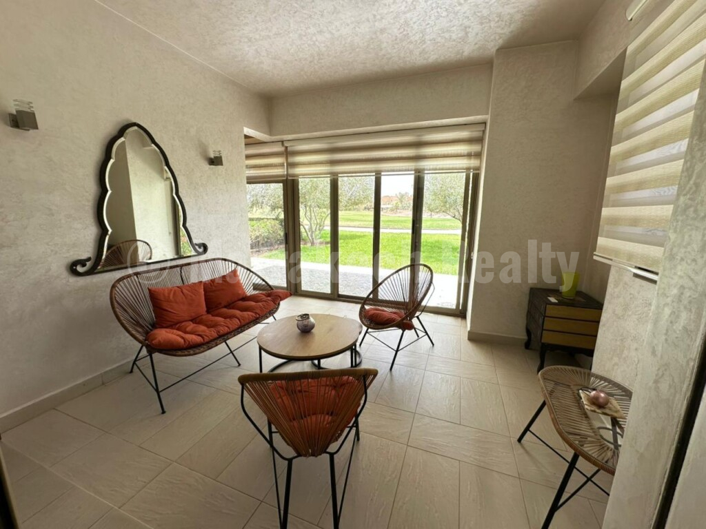 Appartement de trois pièces en rez-de jardin dans une résidence fermée