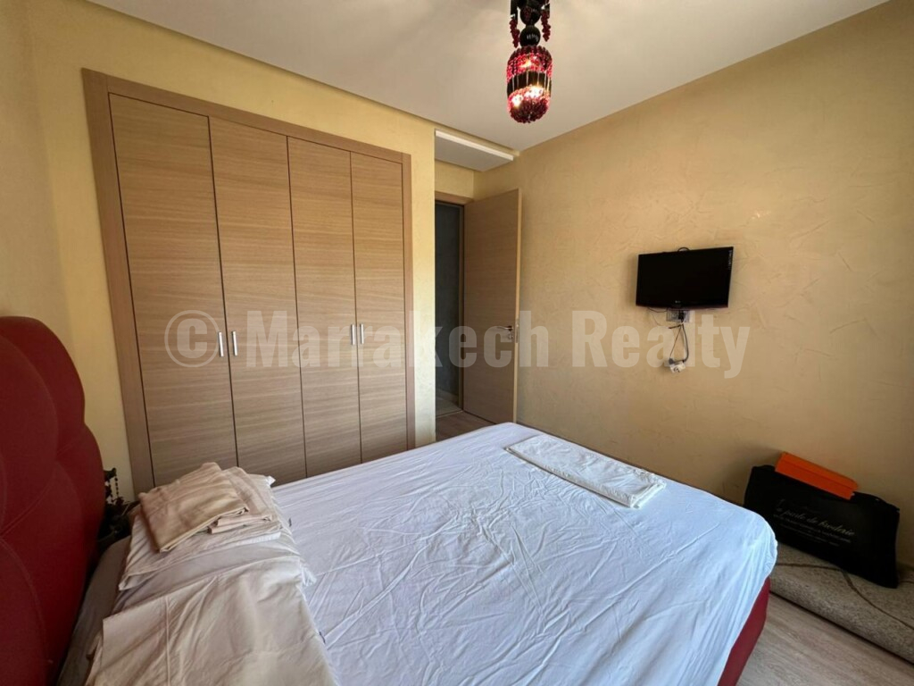 Appartement de trois pièces en rez-de jardin dans une résidence fermée