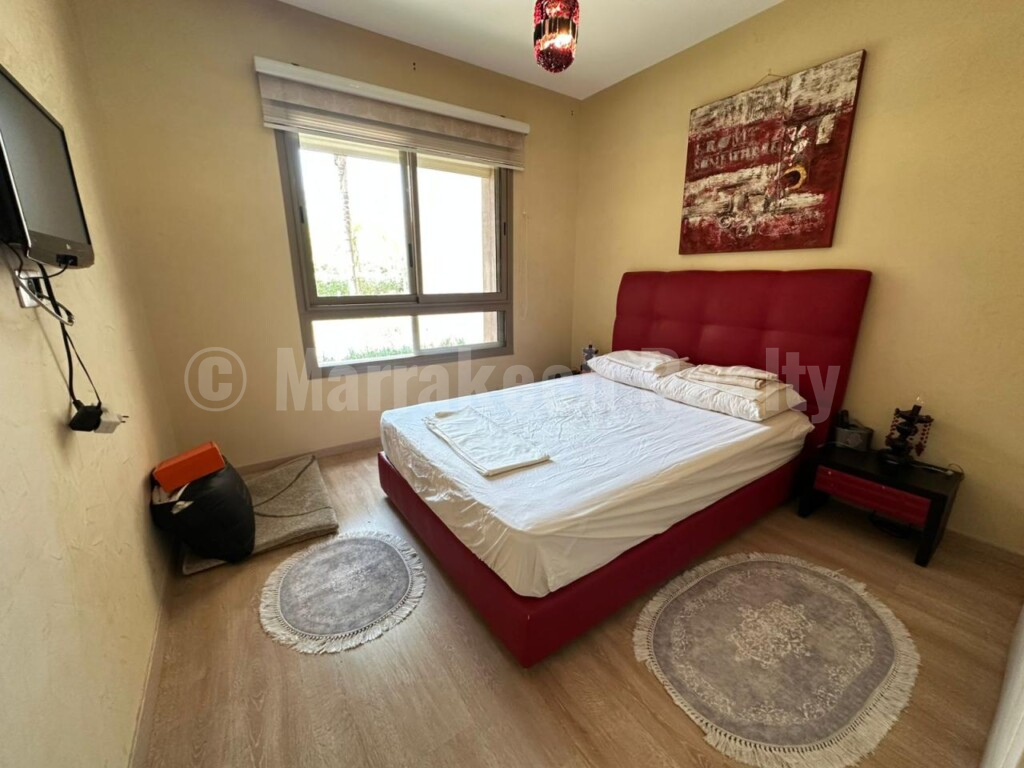 Appartement de trois pièces en rez-de jardin dans une résidence fermée